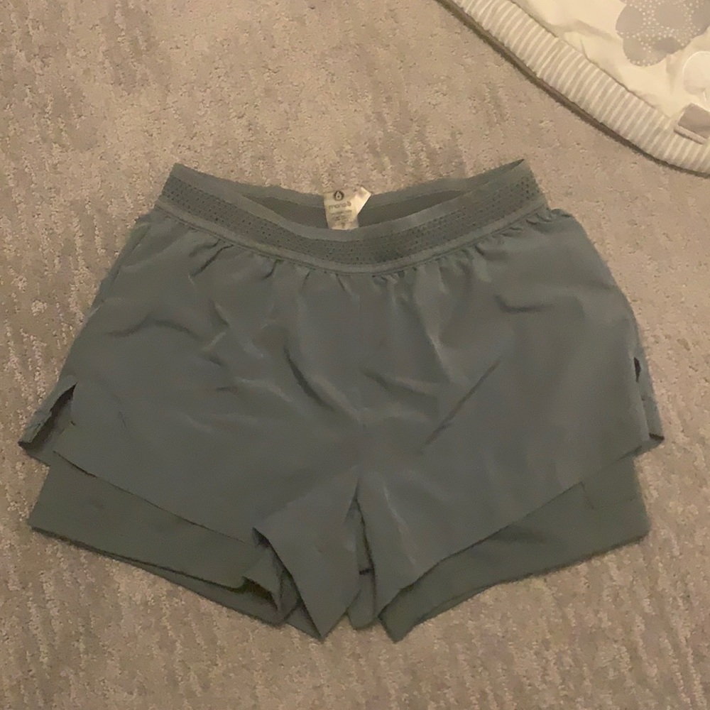 Green double layer athletic shorts